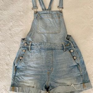 Light wash  overalls.